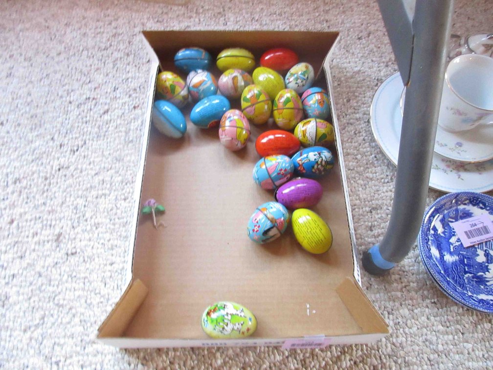 Flat of vintage tin litho candy eggs