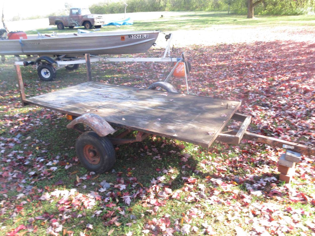 Metal trailer with wood deck