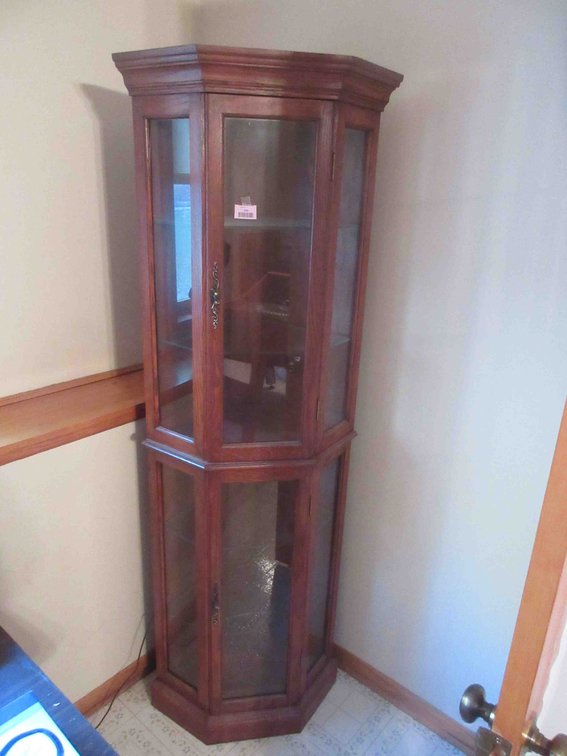 Lighted corner curio cabinet