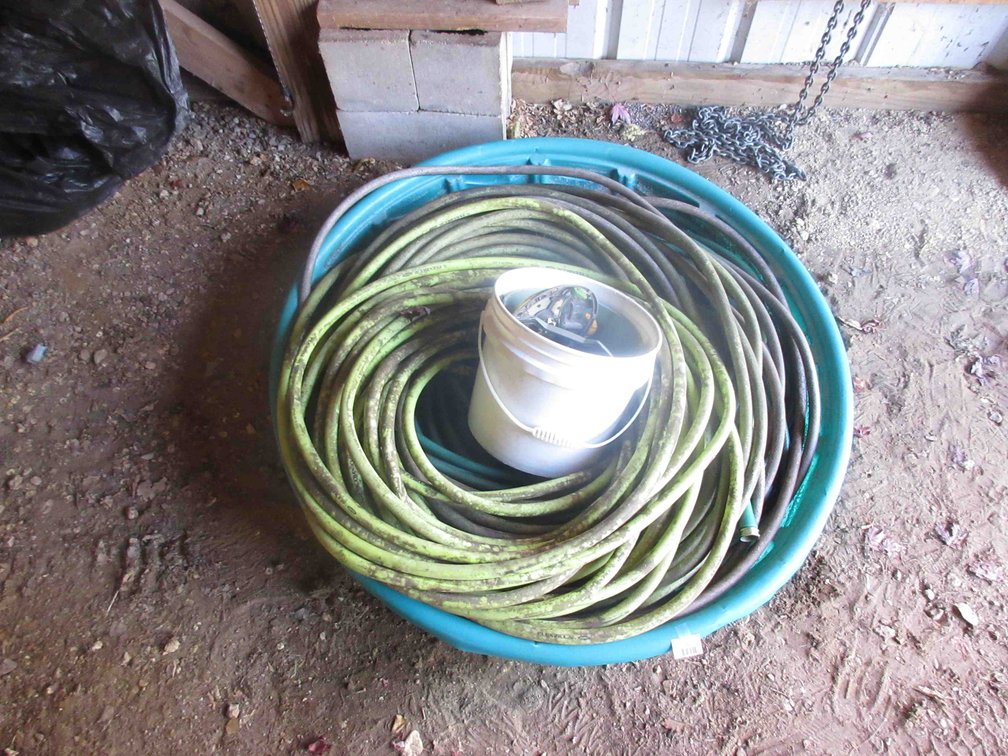Plastic pool with hoses