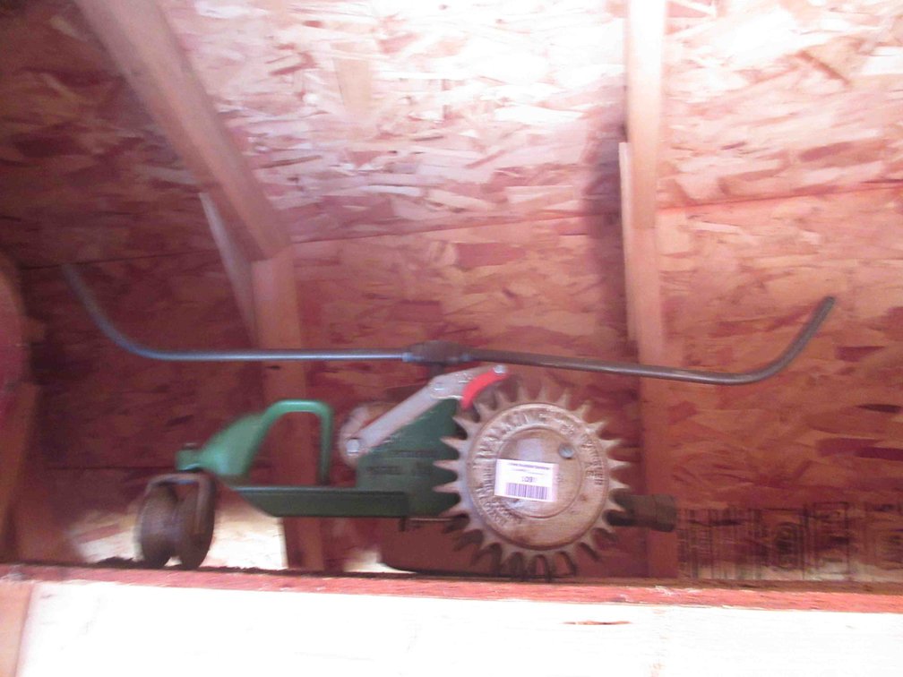 Walking tractor lawn sprinkler