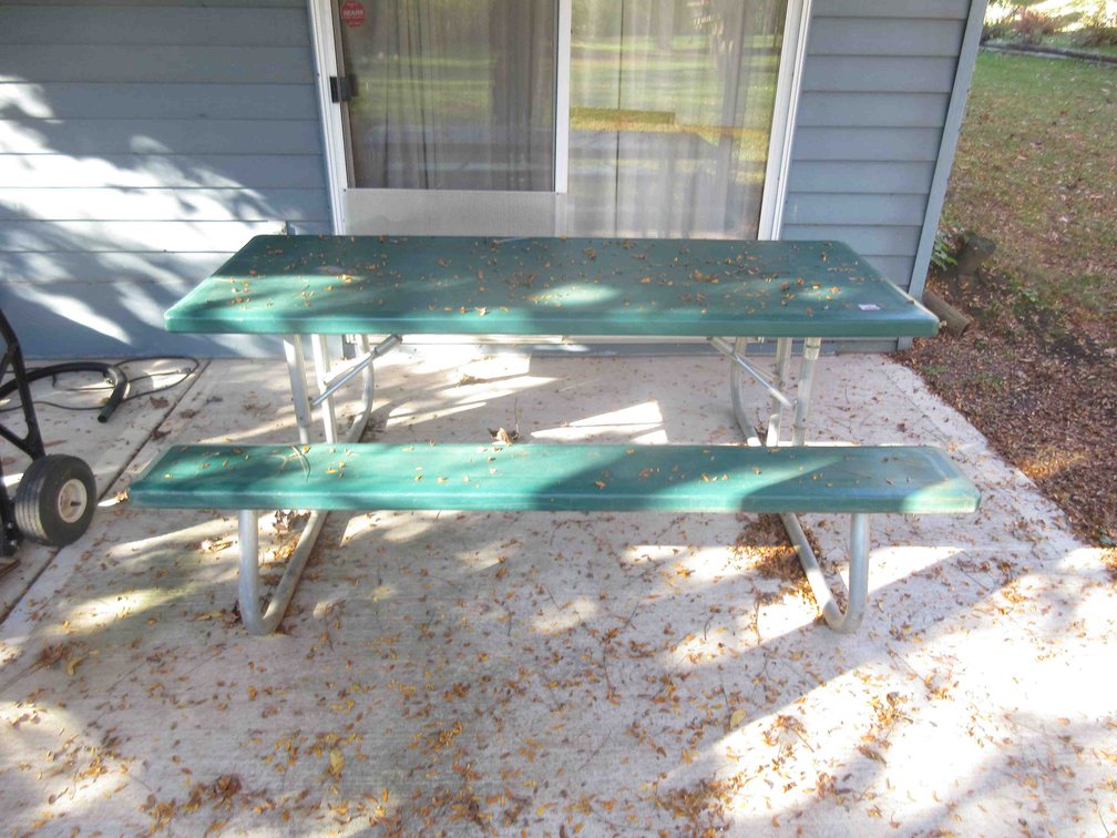 Metal and plastic picnic bench