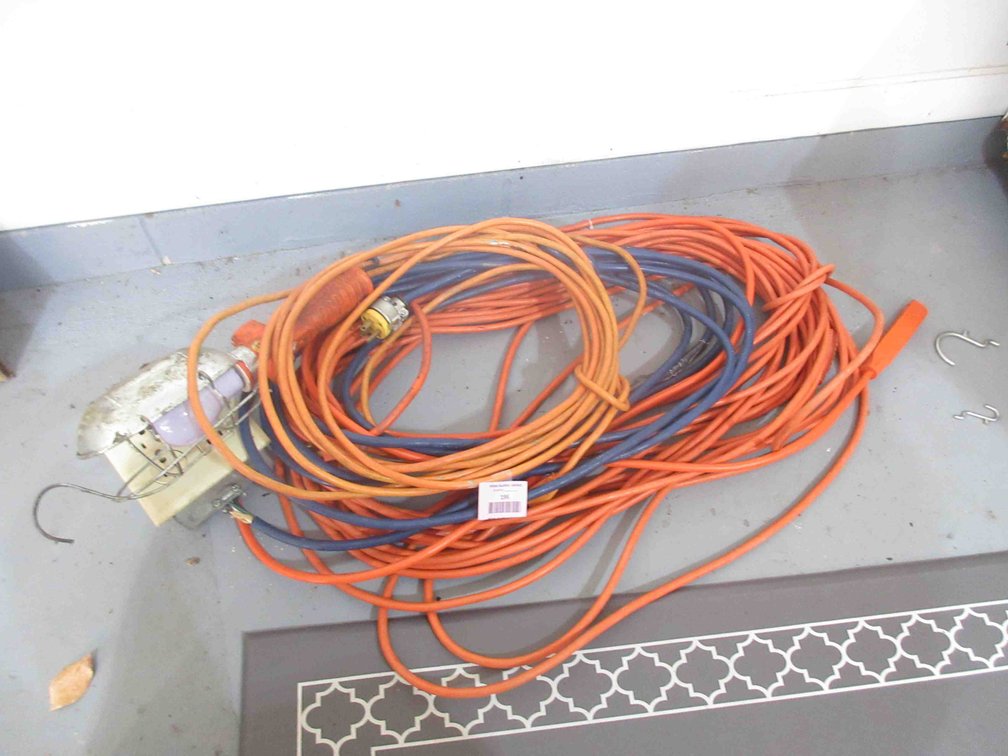 Group of extension cords and  work light