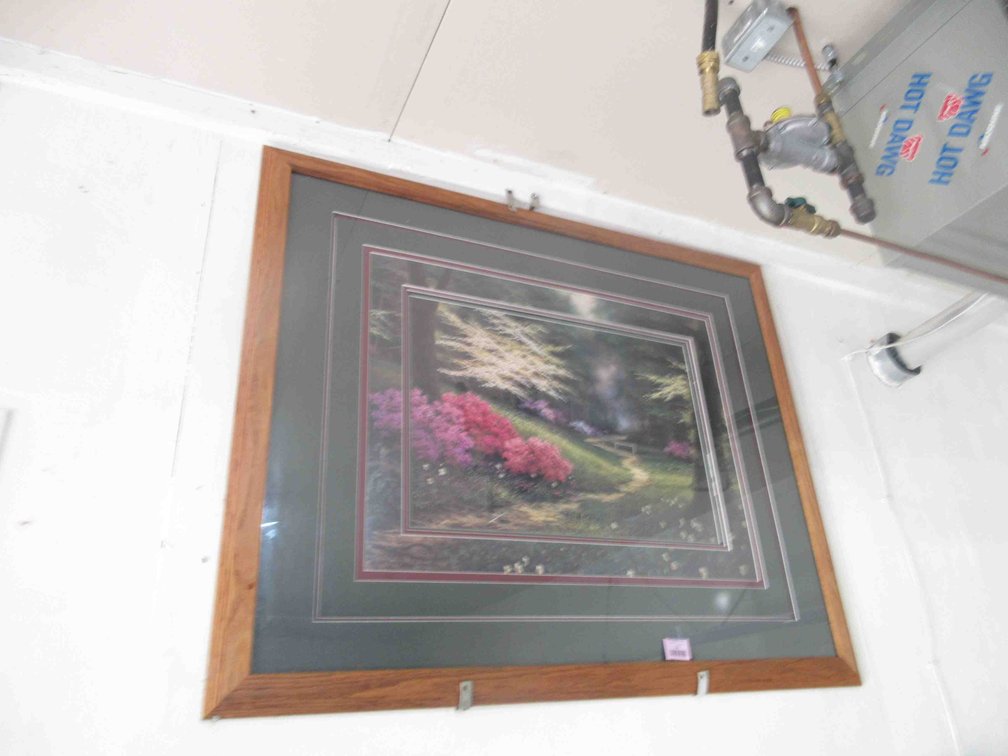 Large wooded and floral print in frame