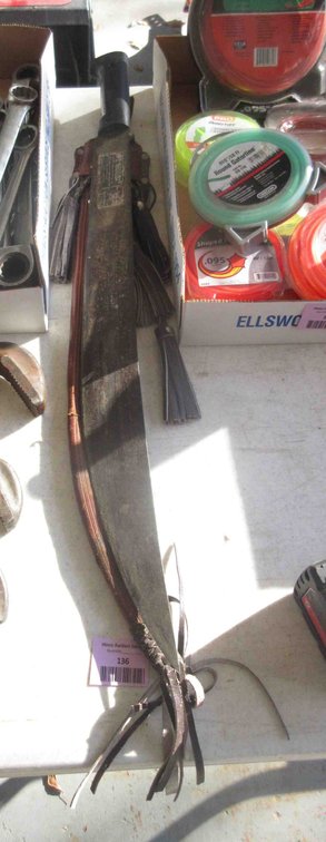 Corona machete with leather sheath