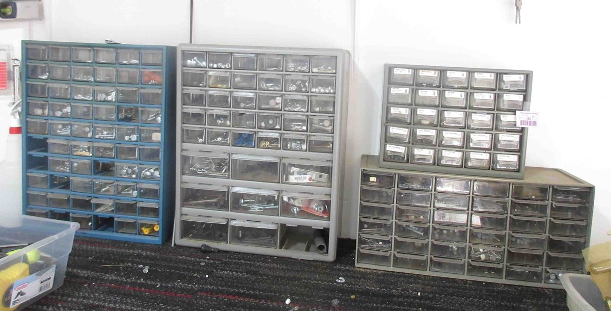 (4) Plastic hardware bins with hardware