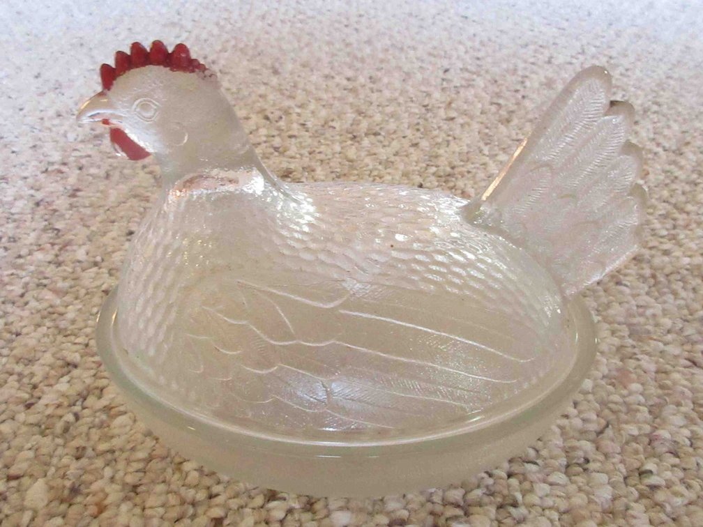 Clear glass hen on nest dish