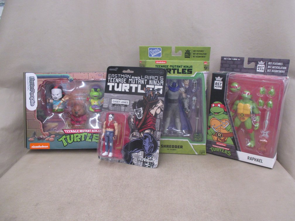 (3) Teenage Mutant Ninja Turtle action figures and set of Little People