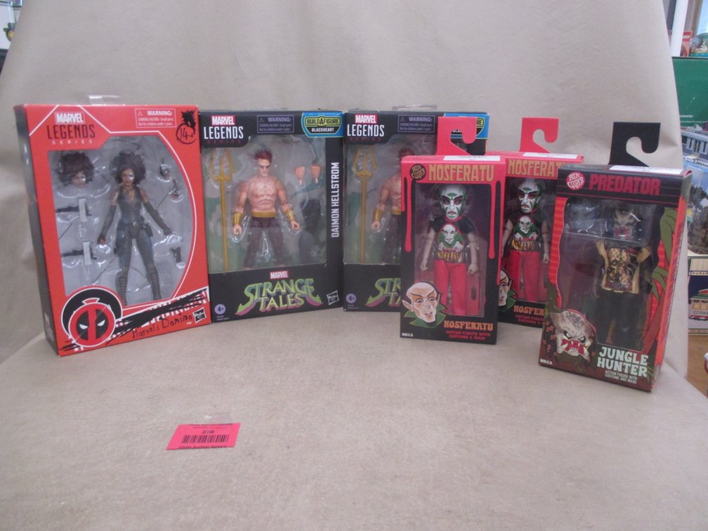 (6) Marvel and Ben Cooper action figures in boxes