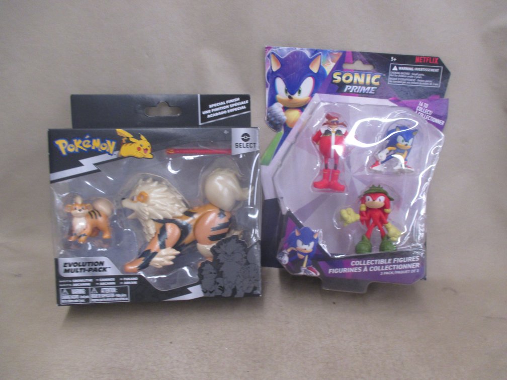 (2) New in package figurine sets