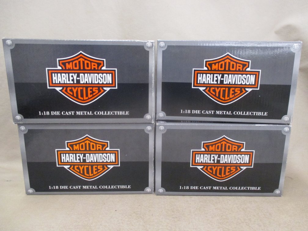 (4) Harley Davidson die cast motorcycles