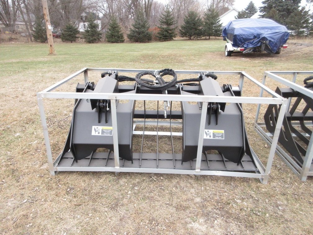 Rock grapple bucket with quick tatch for skid steer