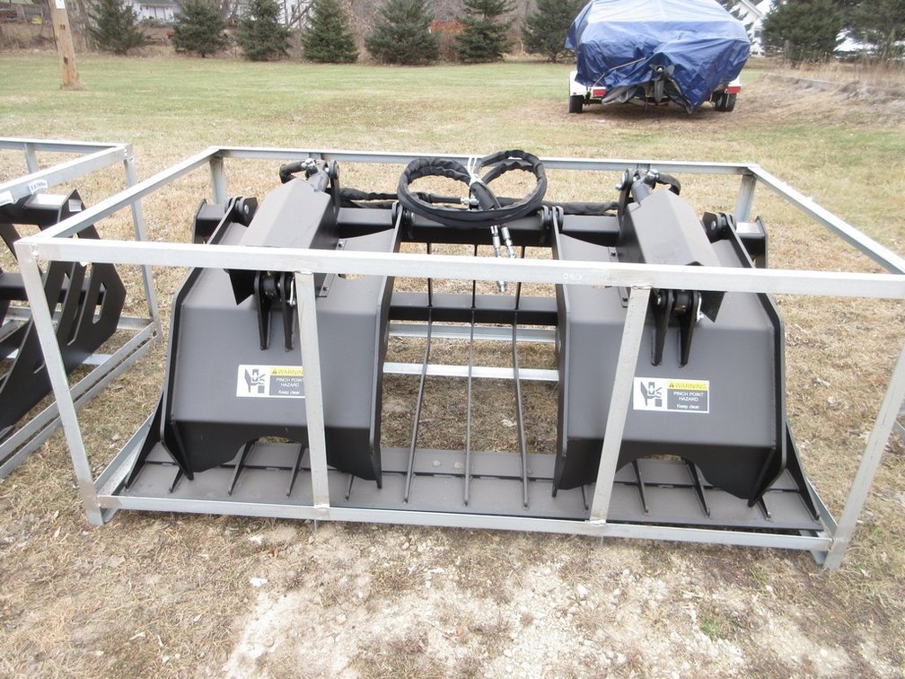 Rock grapple bucket with quick tatch for skid steer