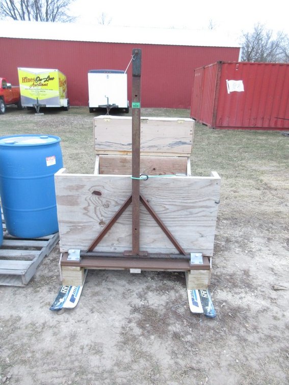 Homemade wood sled on skis