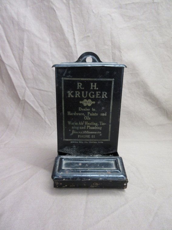 "R. H. Kruger, Biscay, Minnesota" advertising metal matchstick holder