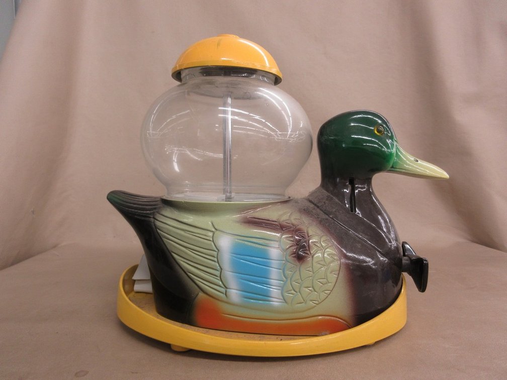 Cast metal duck gumball machine