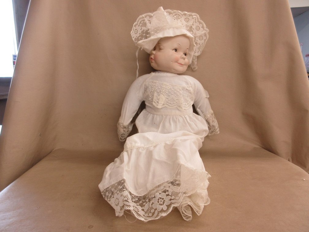 Porcelain head 4-face doll