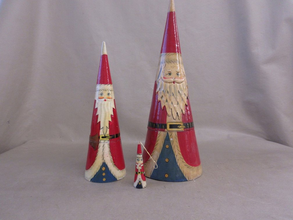 (3) Wood nesting Santas