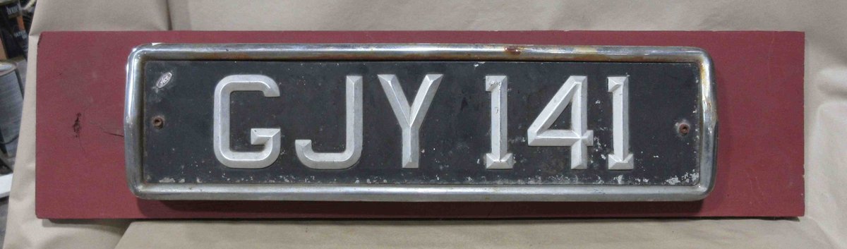 Embossed steel license plate
