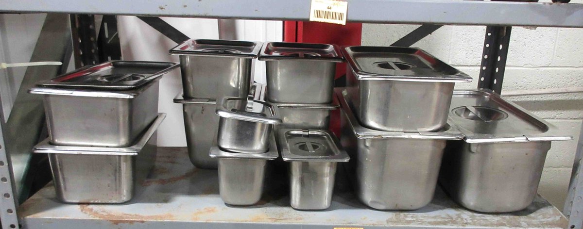 Group of NSF stainless steel buffet containers with lids