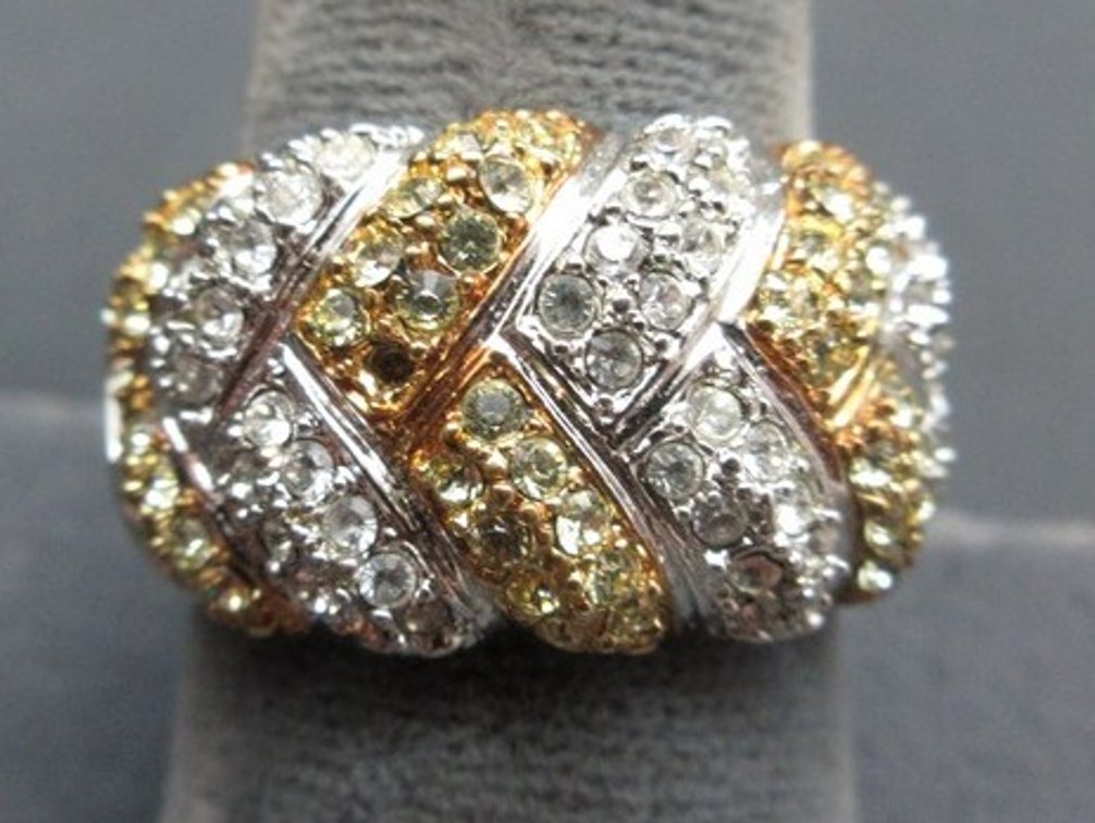 .925 Marked silver cocktail band with multiple clear and gold tone stones (missing 1 stone)