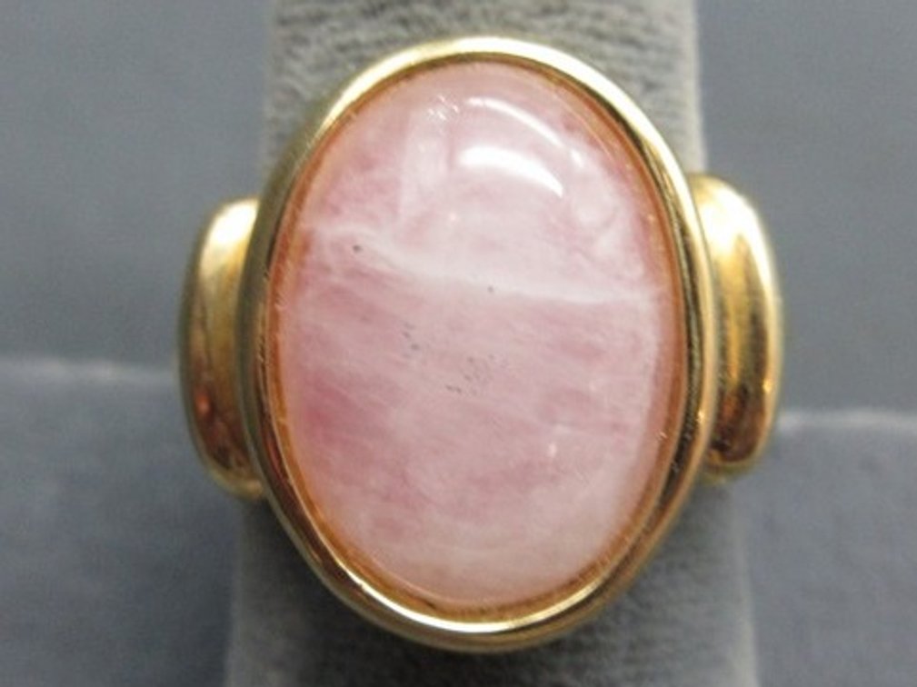 Marked .925 gold tone ring with large oval pink quartz