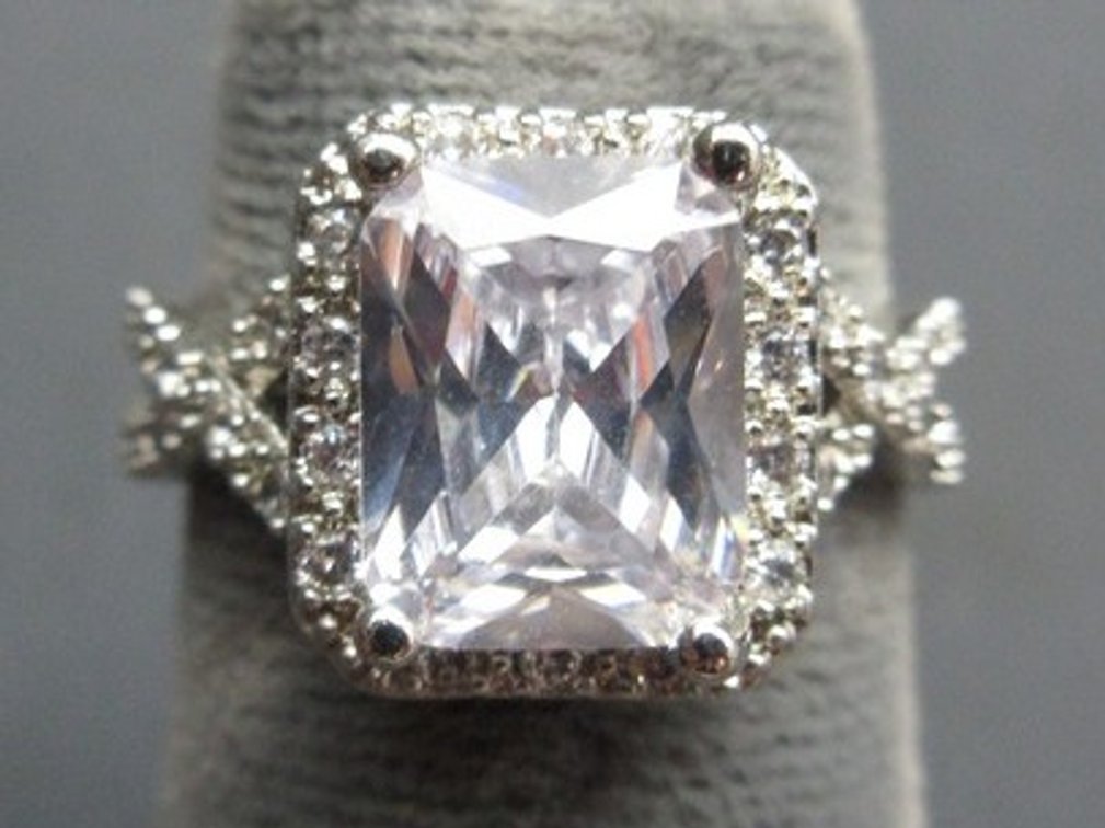 Marked .925 silver ring with square-cut and small cz's