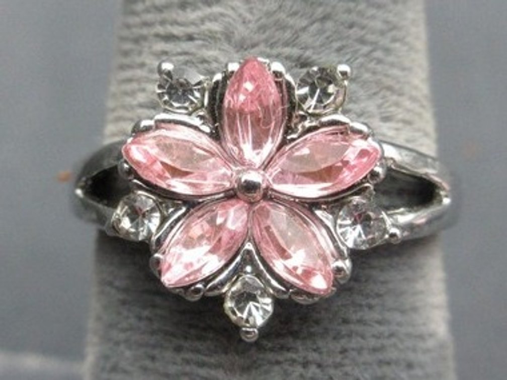Unmarked silver-tone ring with pink and clear stones
