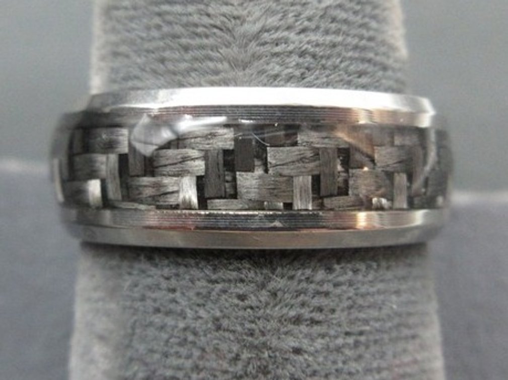Unmarked silver-tone band ring with woven gray center band