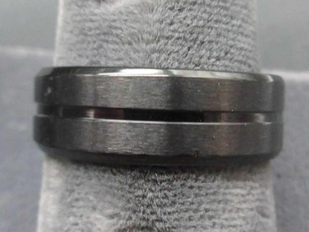 Unmarked black band ring