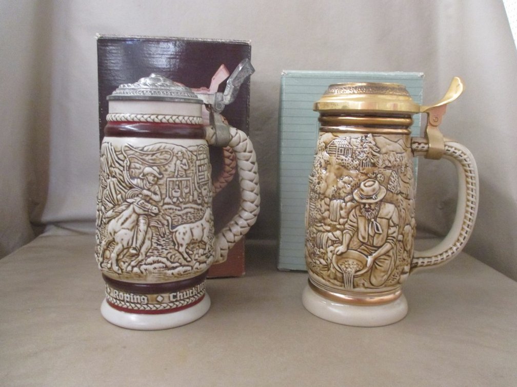 (2) Collector Avon porcelain steins in box