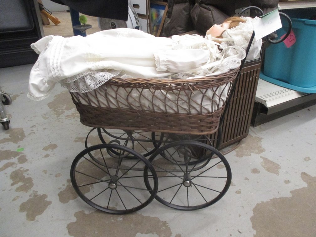 Antique baby buggy with 20" Towle porcelain doll