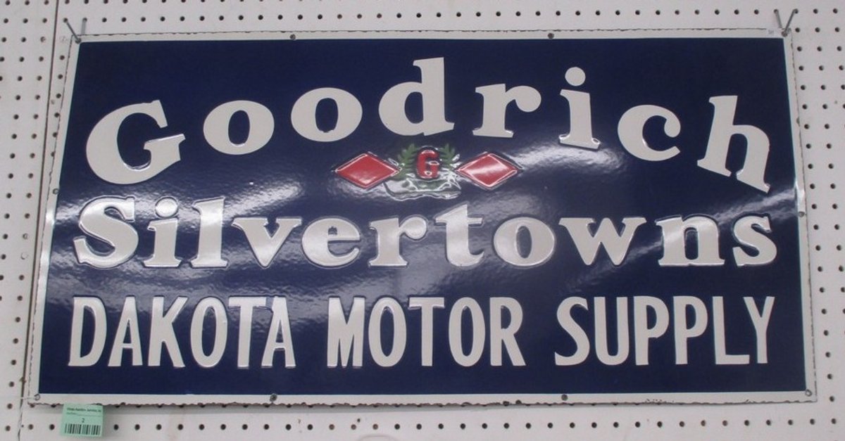 Porcelain on steel "Goodrich Silvertown Dakota Motor Supply" sign