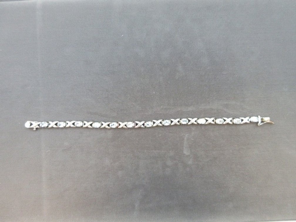 Dee Berkley .925 silver tennis bracelet with blue topaz stones