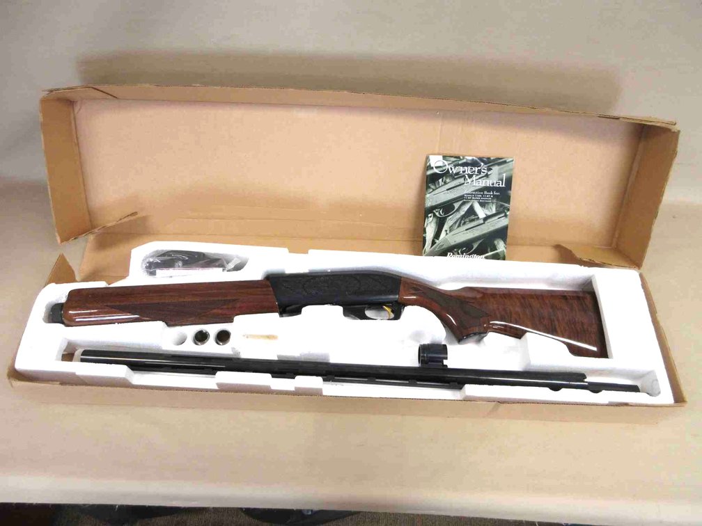 Remington model 11-87 Premier 12-gauge semi auto shotgun (subject to transfer fees)