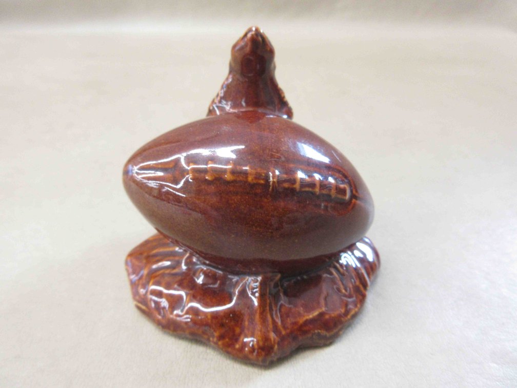 Red Wing Pottery Badger and Football figurine