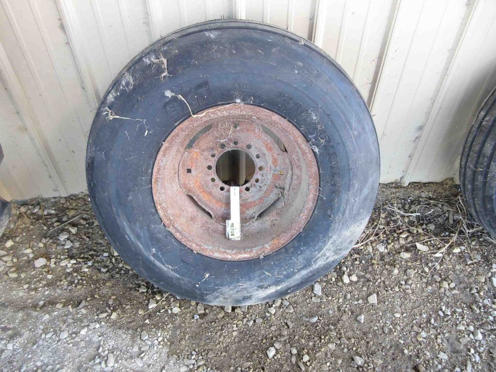 Newer implement tire on rim