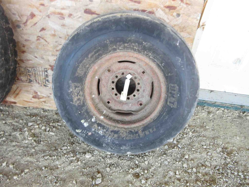 Implement tire on rim