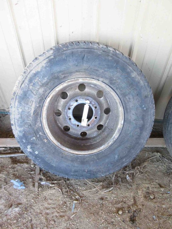 Used truck tire on 8-bolt rim