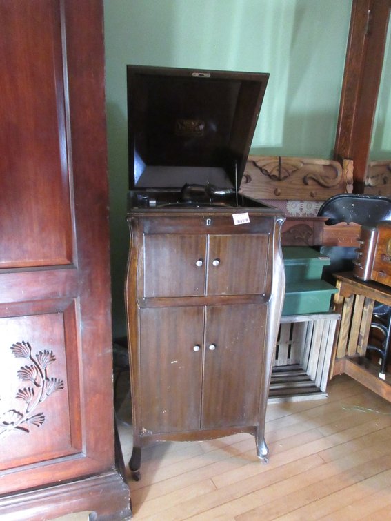 Victor Talking Machine player with vintage records 