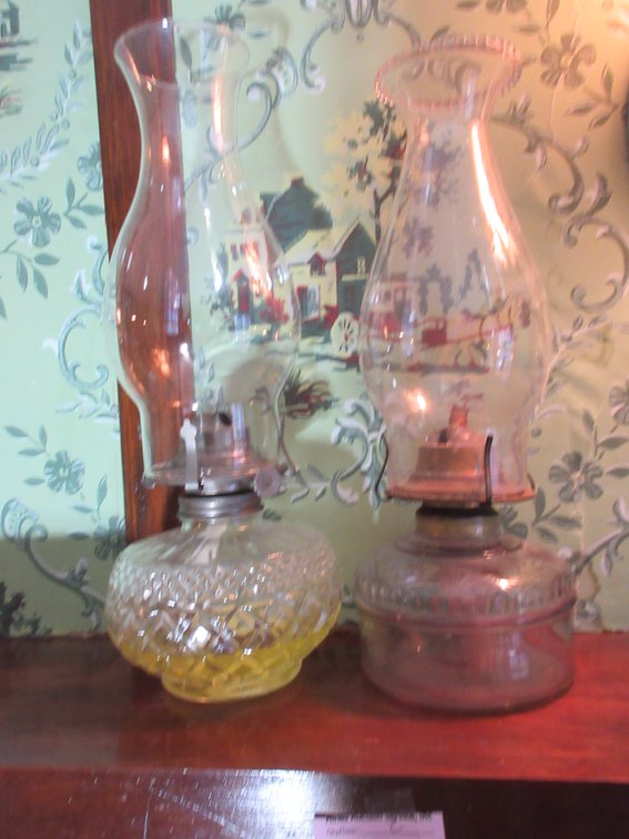 (2) Antique oil lamps with chimneys