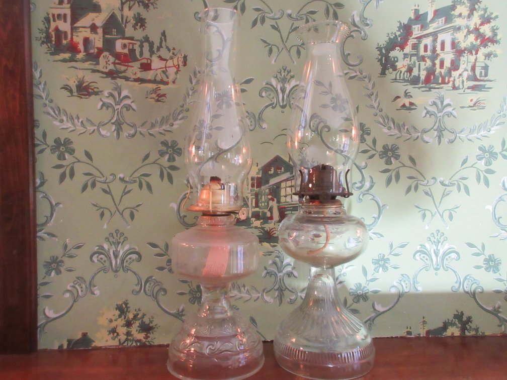 (2) Antique oil lamps with chimneys