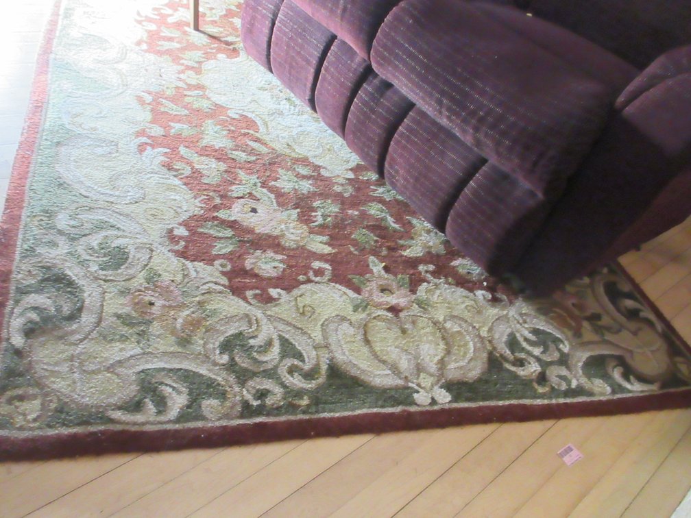 Maroon area rug