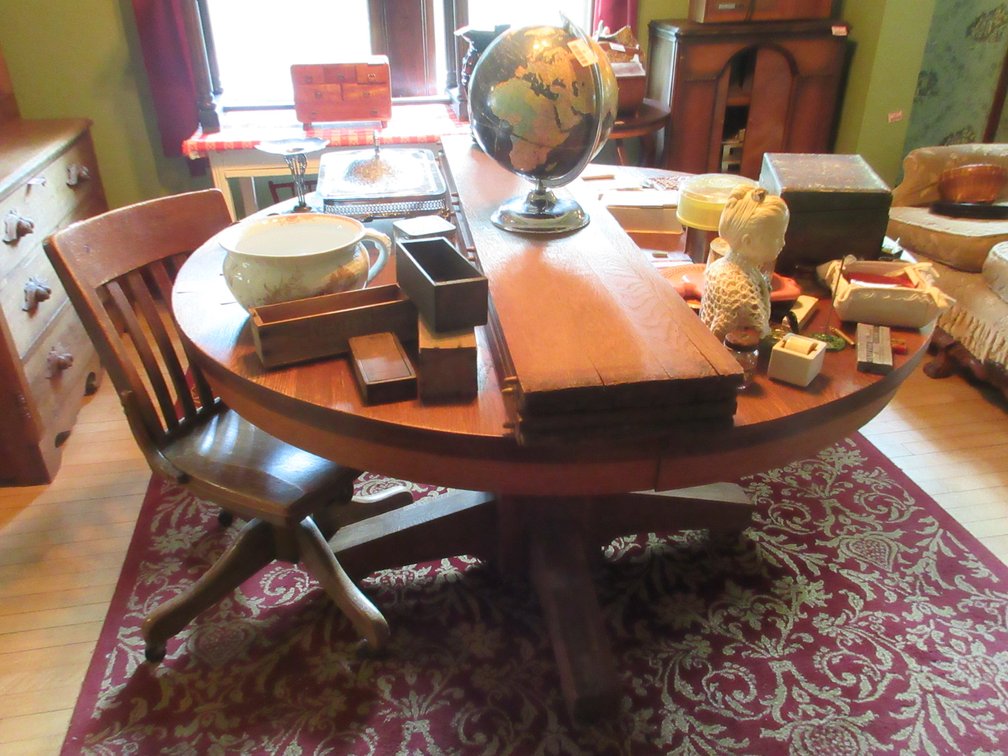 Antique round oak dining table