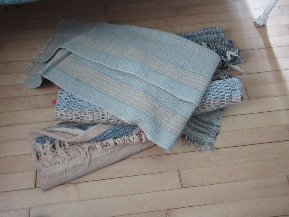 Group of hand woven rugs