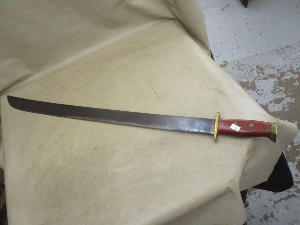 Vintage style metal sword with brass and wood handle 