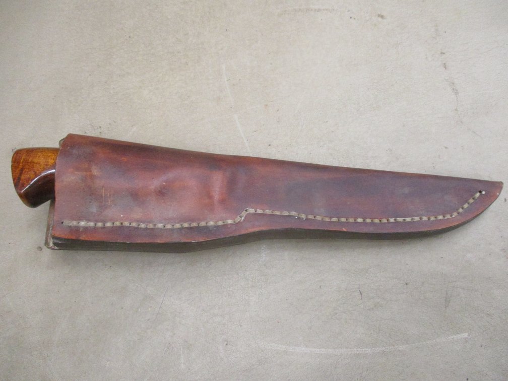 Hunting knife in sheath