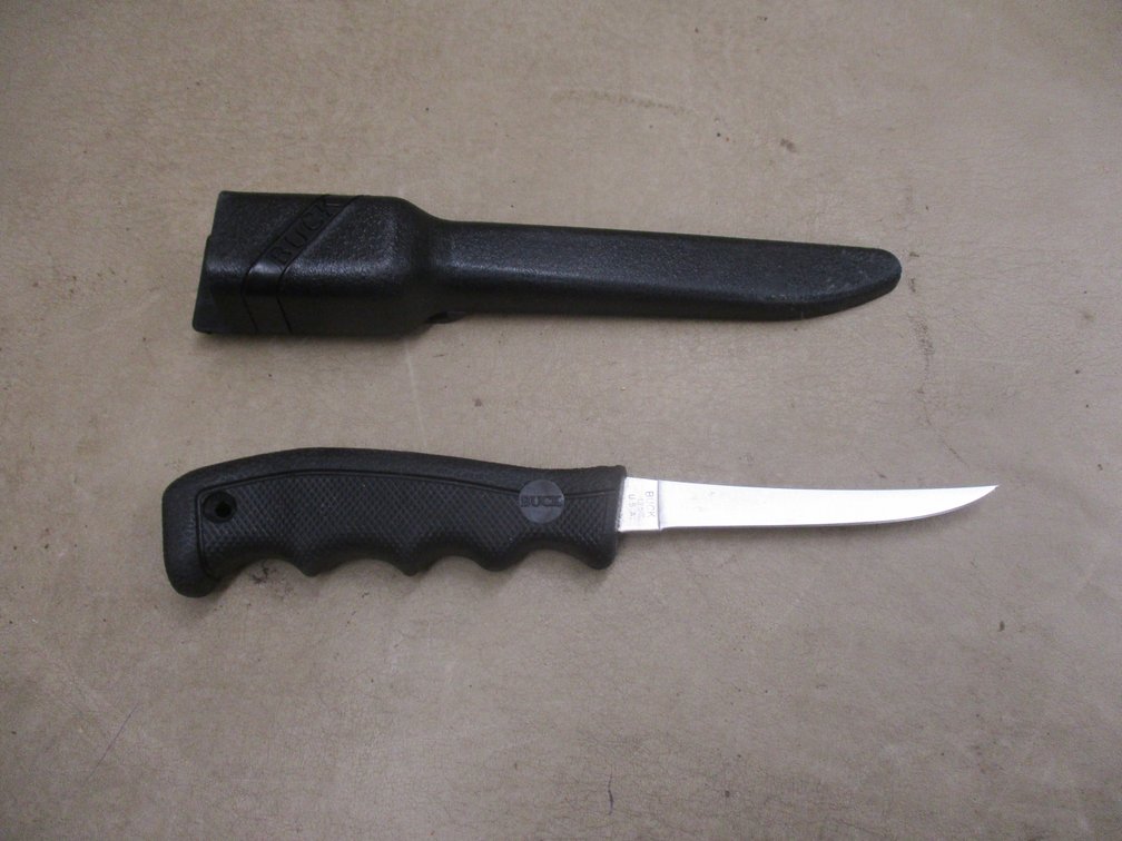 Buck boning/fillet knife in plastic sheath