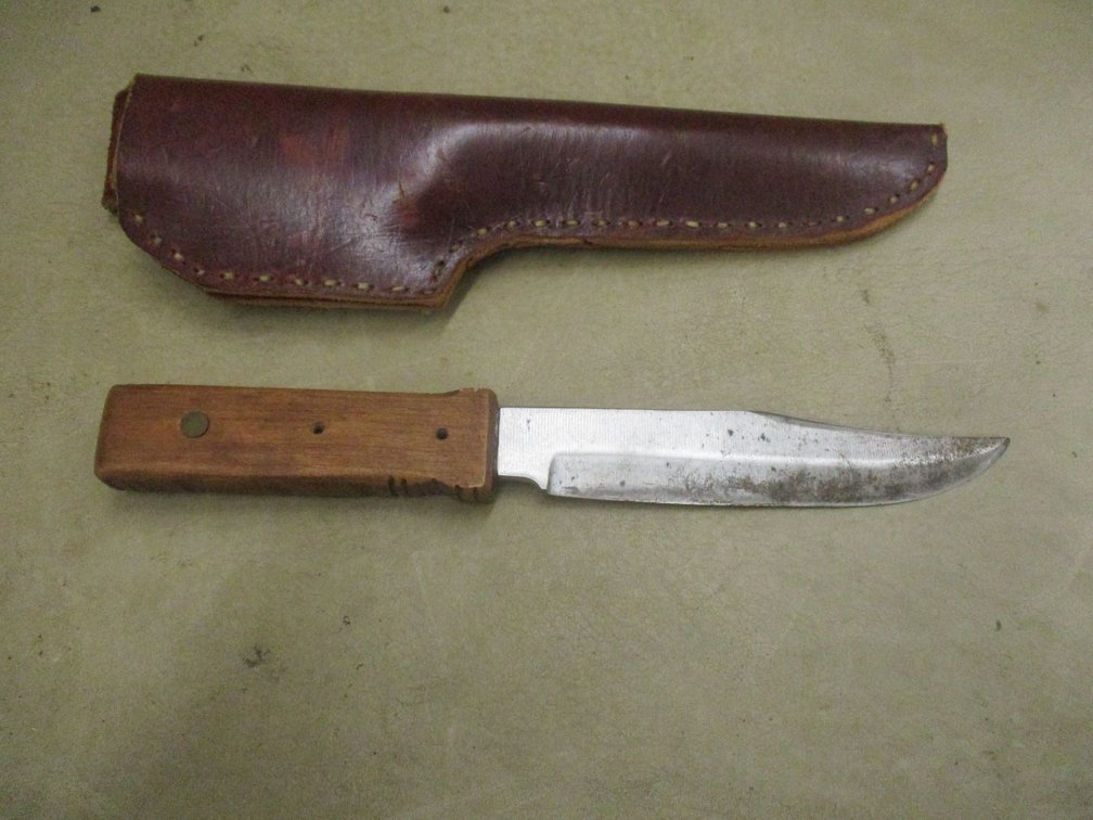 Hunting knife in sheath