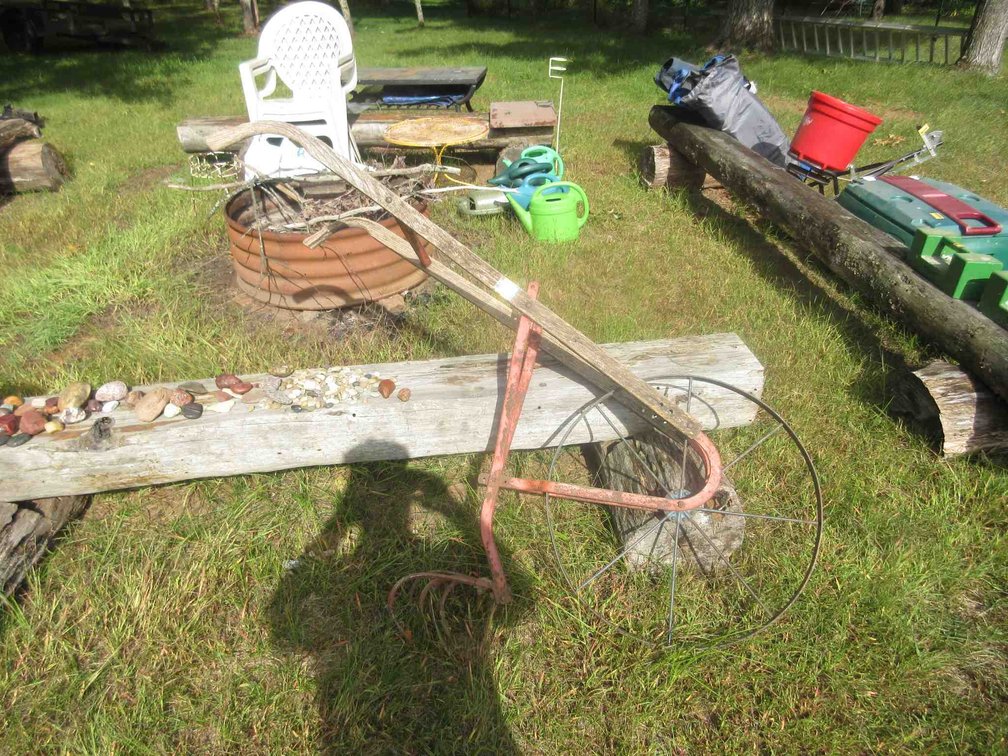 Walk behind antique garden cultivator